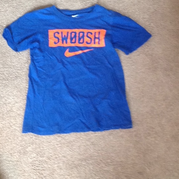 blue and orange nike shirt